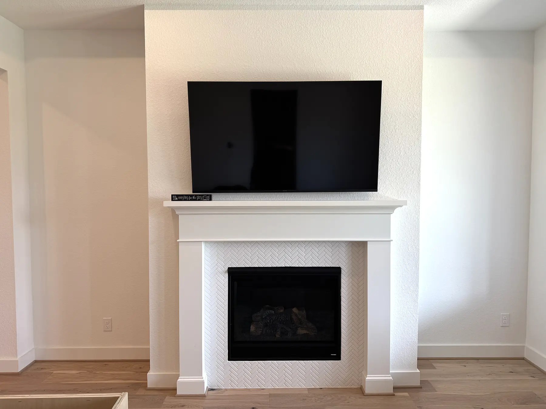 Original fireplace wall before side cabinetry and shelves were added