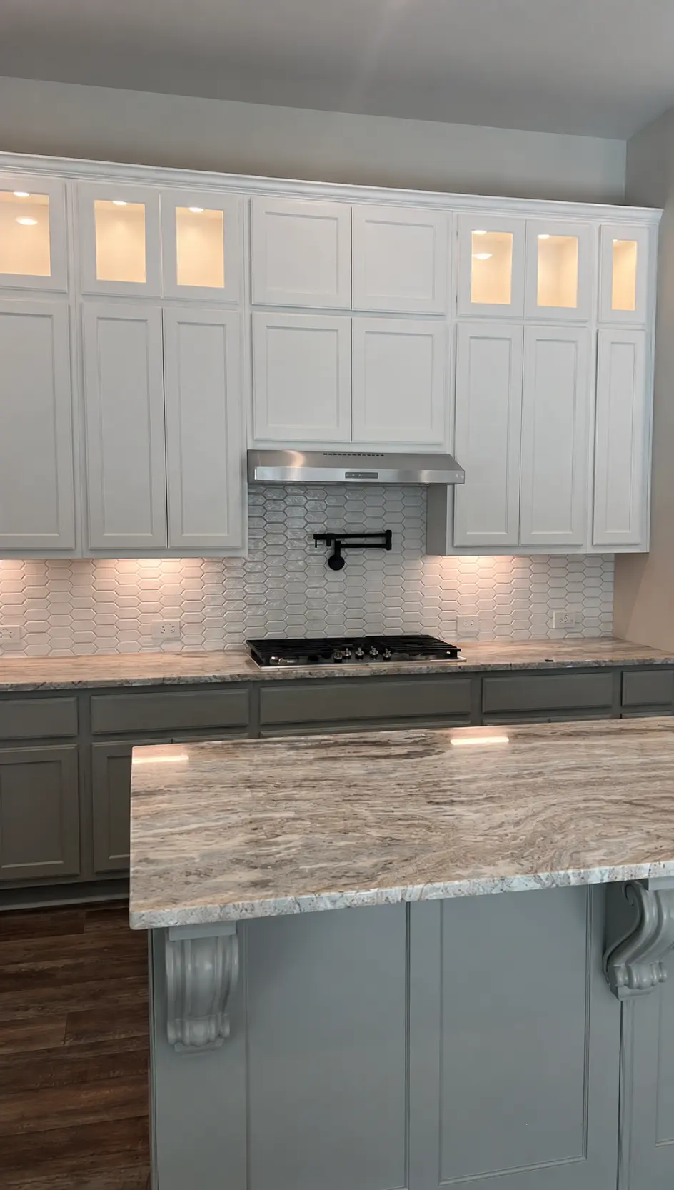 Original cabinets and vent hood before the custom wood hood was built